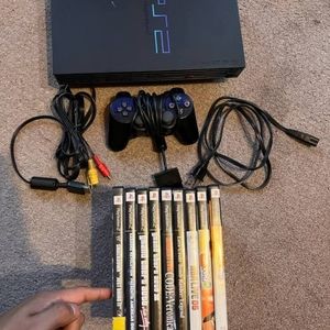 PlayStation 2 comes with one controller and multiple games in great condition y